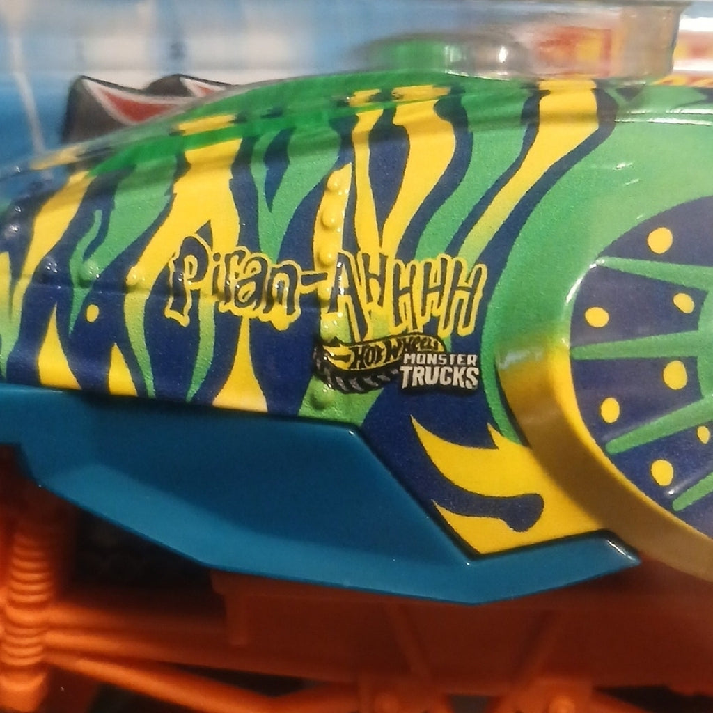 Piran-Ahhh.  Oversized Monster Truck - Green and Yellow With Orange Frame