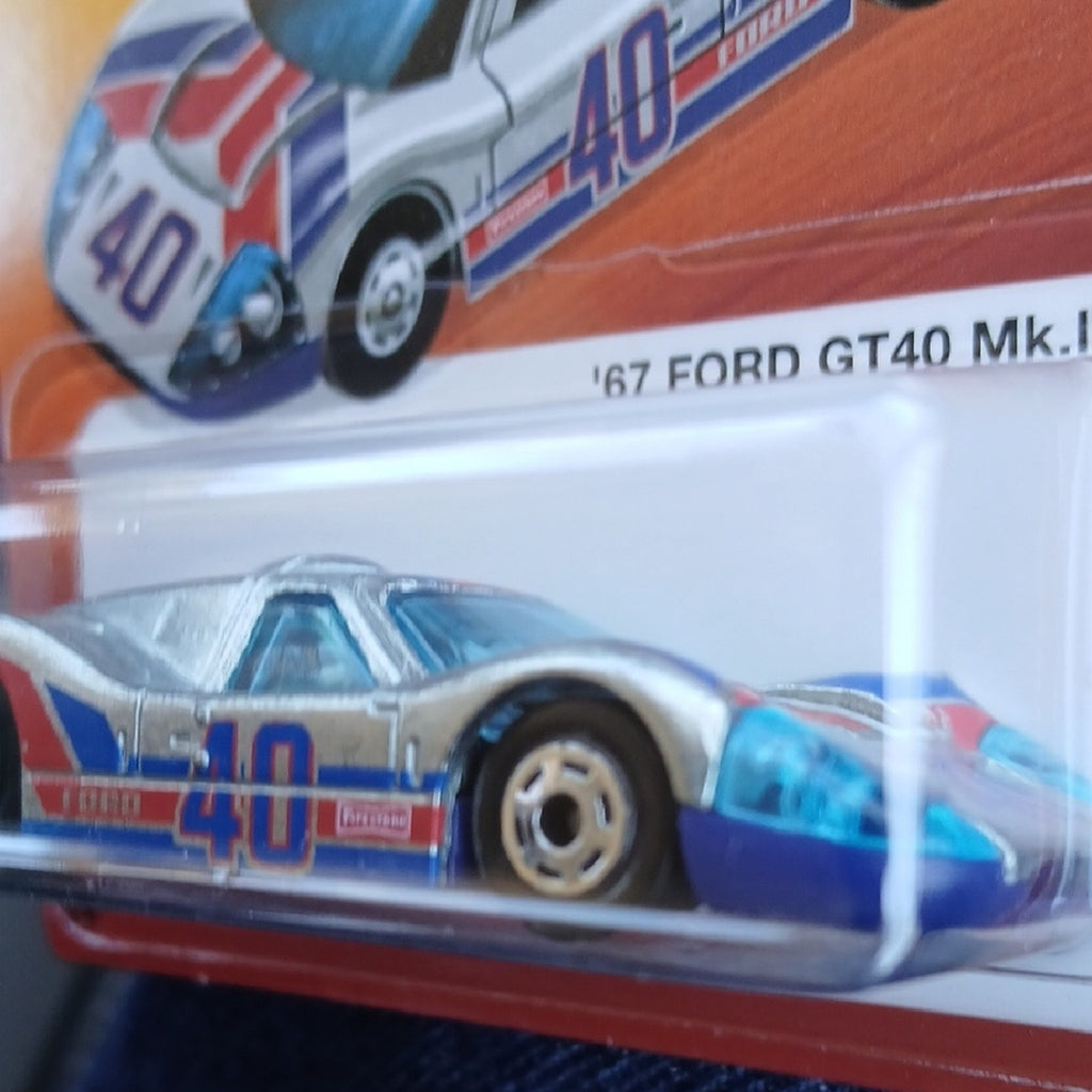 Hot Wheels '67 Ford GT40 Mk.IV Toy Car - White with Blue & Red Accents Hot Ones