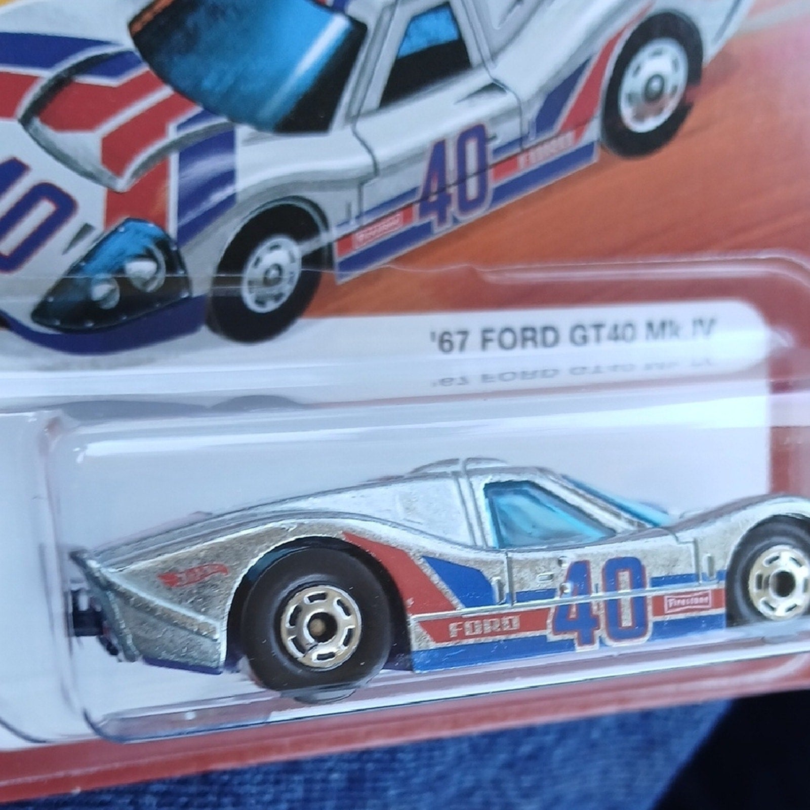 Hot Wheels '67 Ford GT40 Mk.IV Toy Car - White with Blue & Red Accents Hot Ones