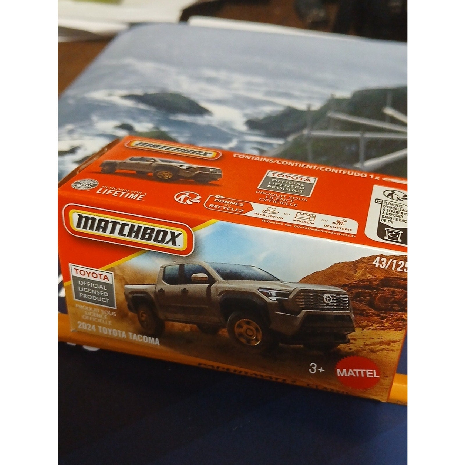 Matchbox Match 2024 Toyota Tacoma Toy Truck in Orange and Gray Box