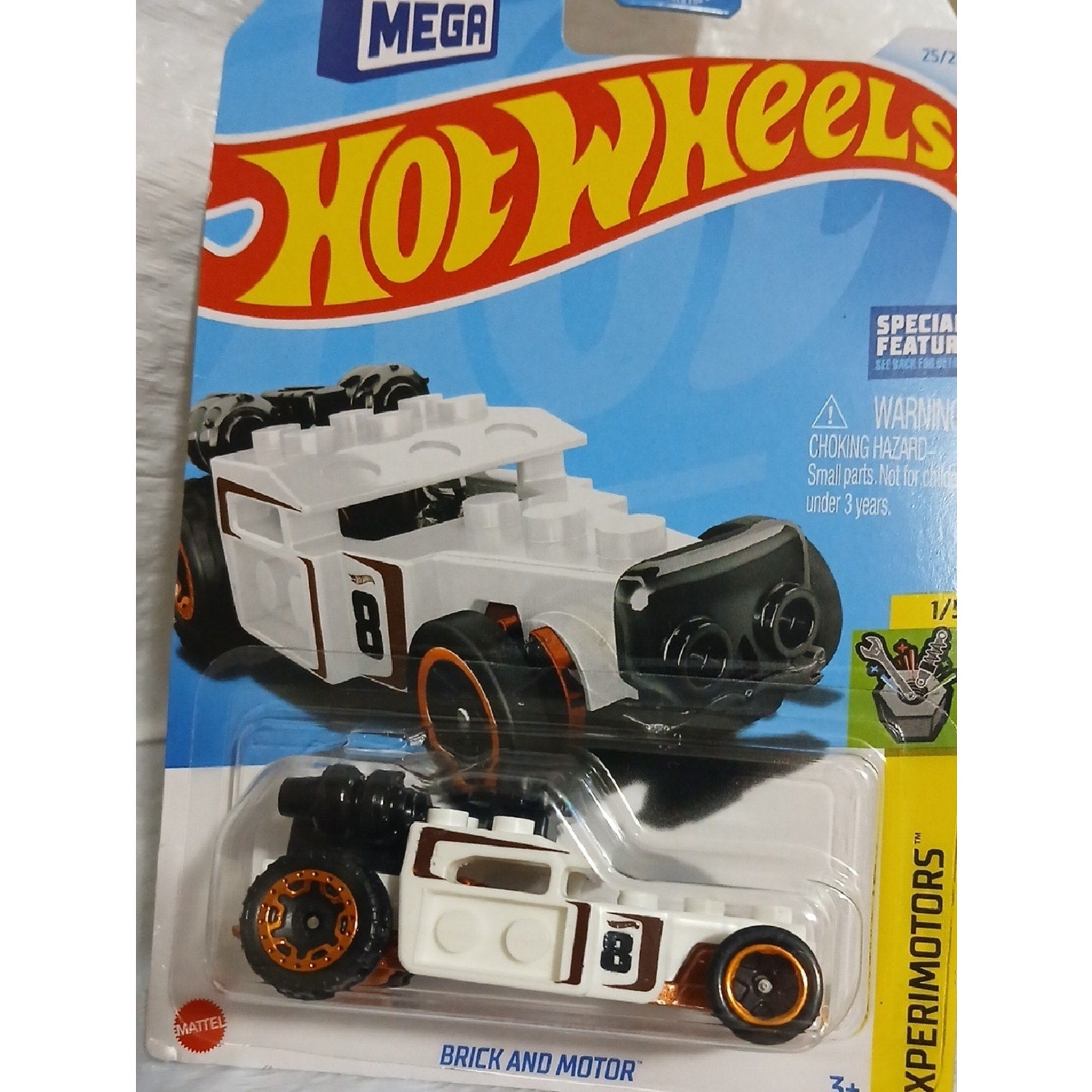 Hot Wheels White Brick and Motor Car With. Special Feature