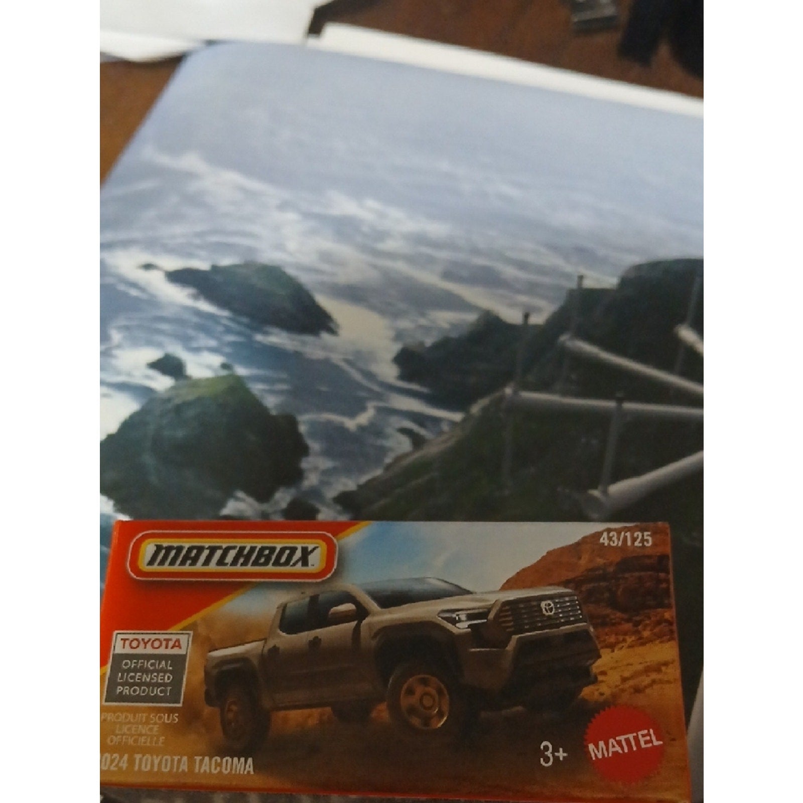 Matchbox Match 2024 Toyota Tacoma Toy Truck in Orange and Gray Box