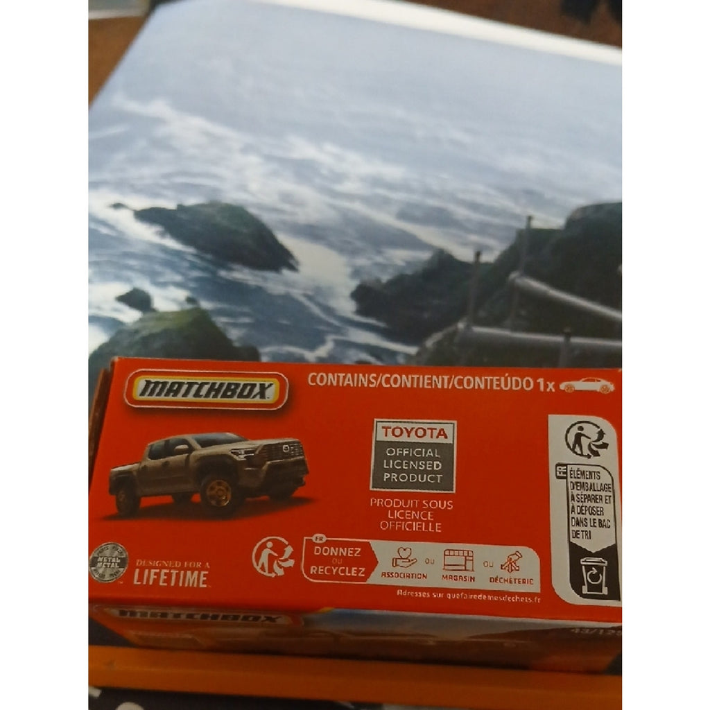 Matchbox Match 2024 Toyota Tacoma Toy Truck in Orange and Gray Box